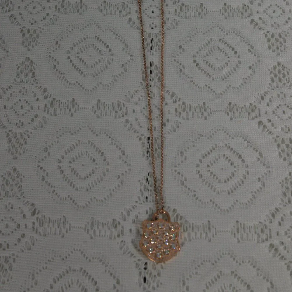 Sparkling Rose Gold Tone Shield Pendant Necklace with Clear Rhinestones